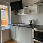 Cille Apartments, Village Baile an Fheirtéaraigh