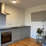 Cille Apartments, Village
