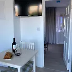 Cille Apartments, Village