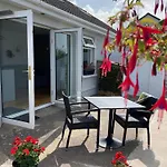 Cille Apartments, Village