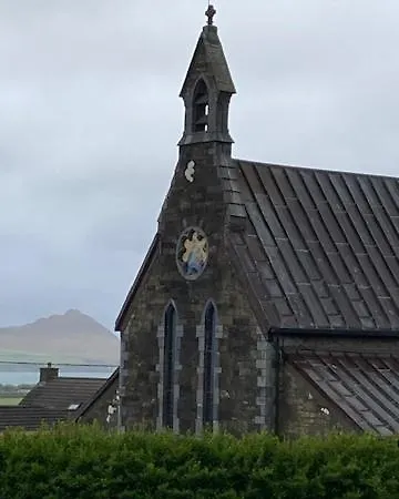 Cille Apartments, Village