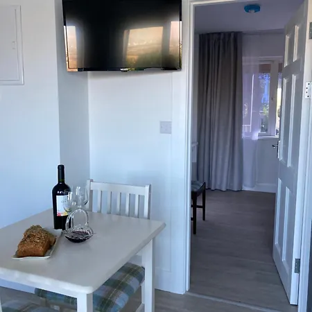 Cille Apartments, Village